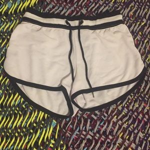 A pair of white and black sleep shorts